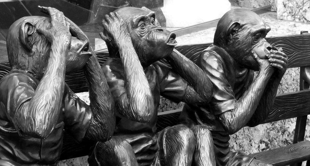 Statues representing the metaphor of the three monkeys — hear no evil, see no evil, speak no evil